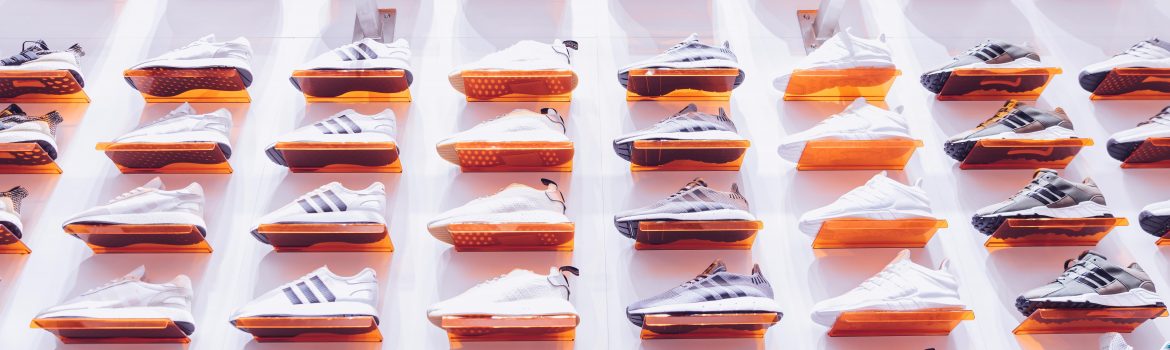 Shopwindow full of sneakers and different models of Adidas, dedicated to post on student's best shoes.