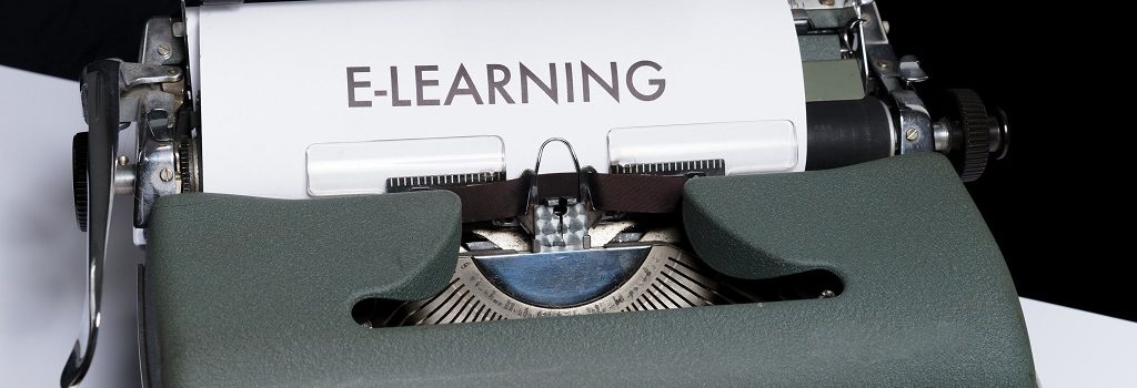 Typing machine and "E-learning" written on it.